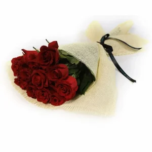 Whisper of Red Roses Bouquet from La Viola – a luxurious arrangement of 10 Dutch red roses wrapped in natural off-white burlap.