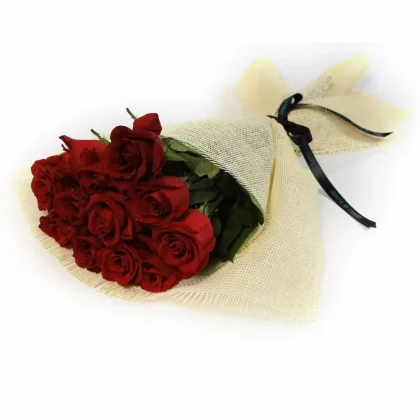Whisper of Red Roses Bouquet from La Viola – a luxurious arrangement of 10 Dutch red roses wrapped in natural off-white burlap.