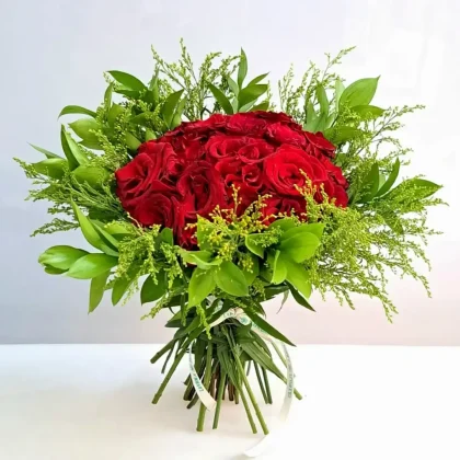 Heart’s Desire red rose bouquet with fresh green foliage, perfect for romantic occasions